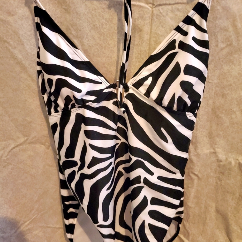 Old Navy Zebra Print One-Piece Swimsuit or bundle a with a 2 for $15 item.